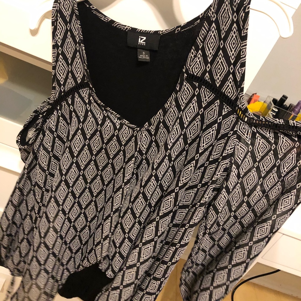 Black and white top with shoulder cutoffs